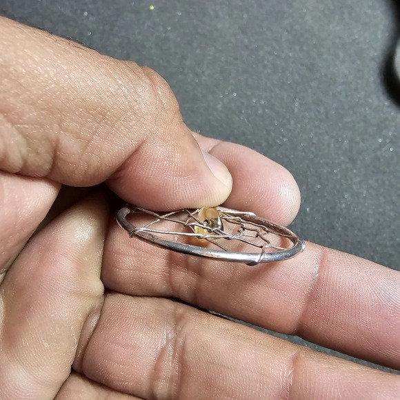 Silver tone dreamcatcher pendant with yellow bead in the center - Picture 4 of 5